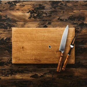 Premium acacia wood cutting board with chef's knife and carving fork set